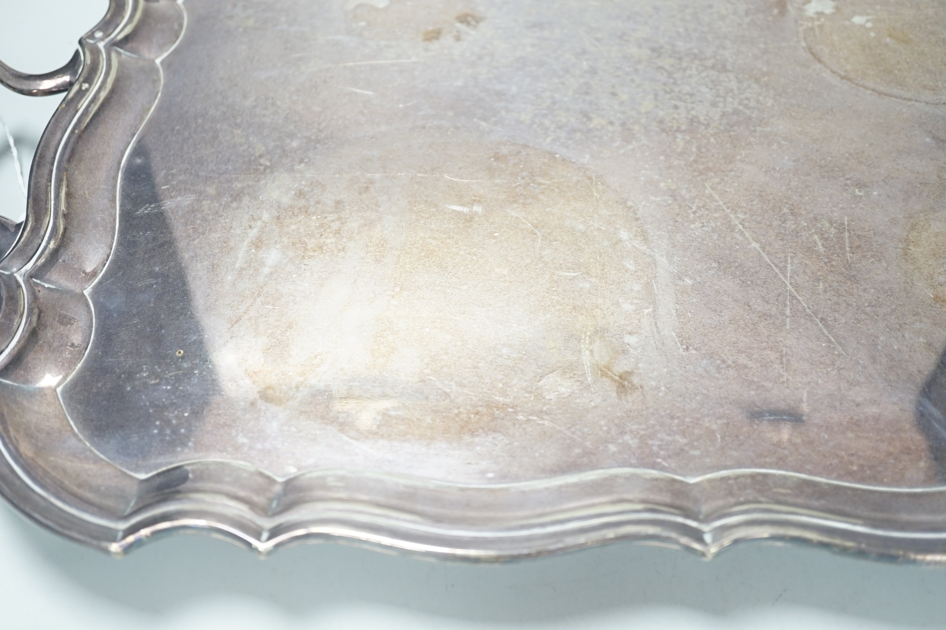 A silver plated two handled tray, 56cm wide